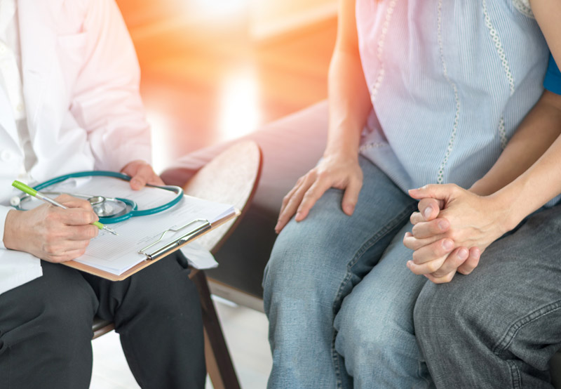 Couple-speaking-to-a-urologist-about-male-infertility-Best-Urologist-in-Orange-County Couple-speaking-to-a-urologist-about-male-infertility-Best-Urologist-in-Orange-County